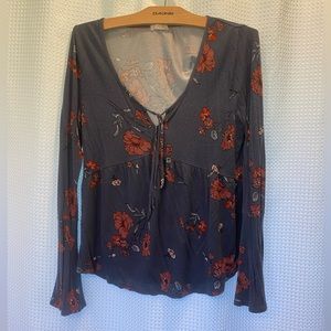 Full Tilt size Medium floral top, long sleeves.